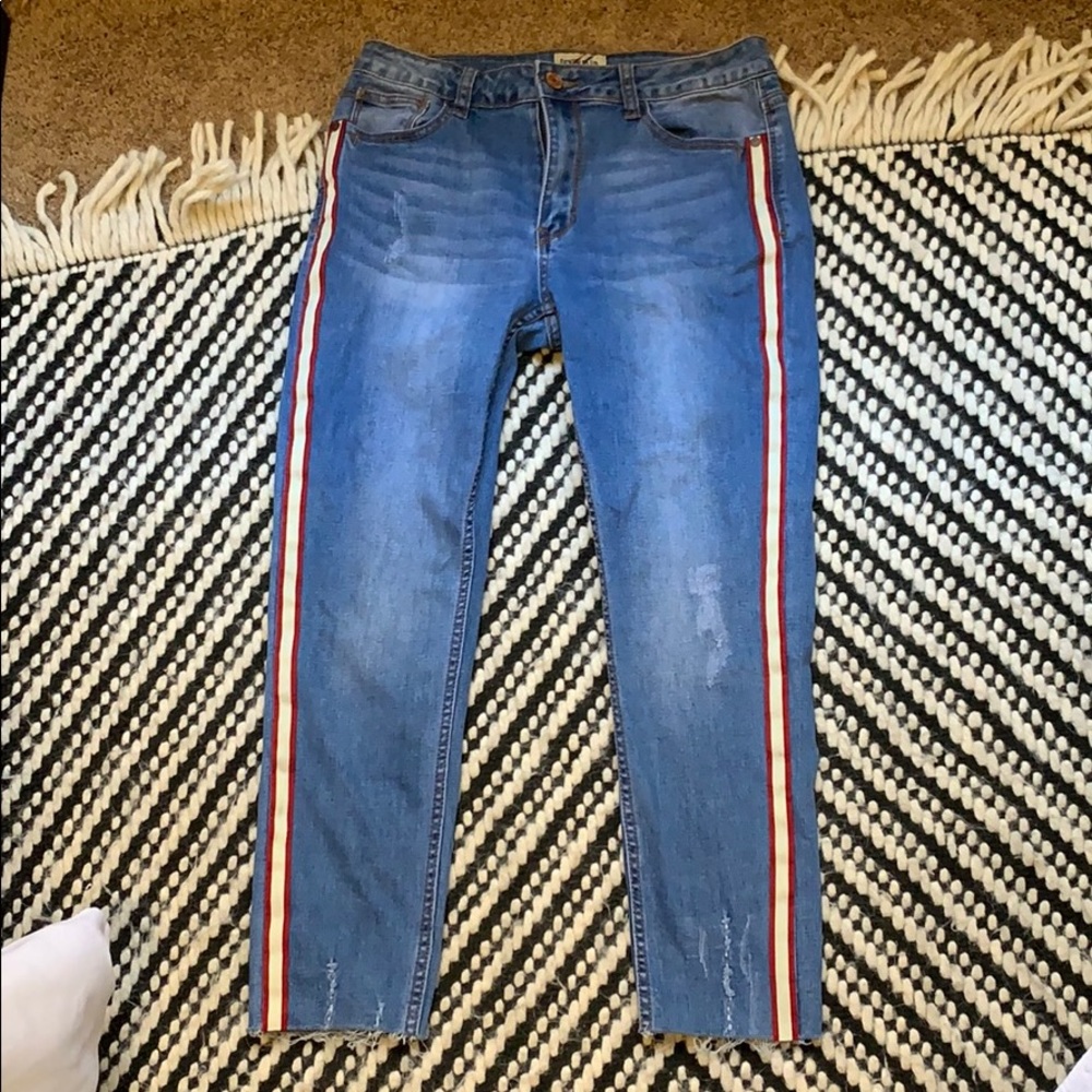 denim jeans with red and white stripe